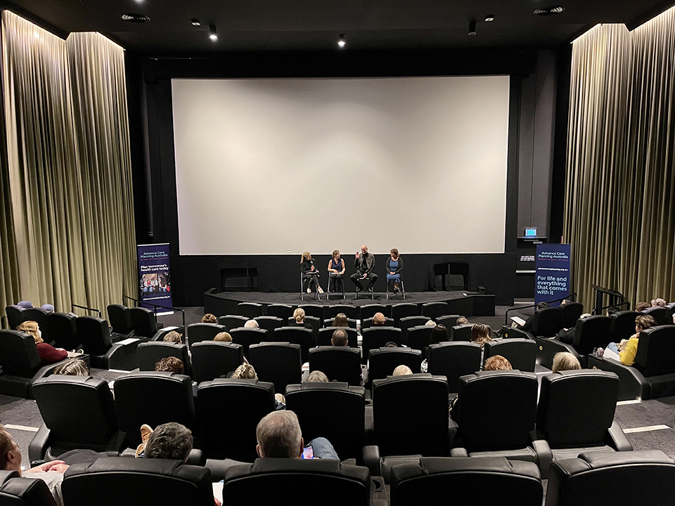 Photo of cinema during expert panel Q&A session.