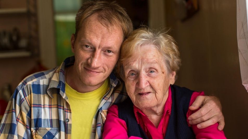 Photo of elderly woman and adult man